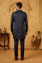 Blue kurta set with detailed white  embroidery of floral patterns and an elephant in bundi