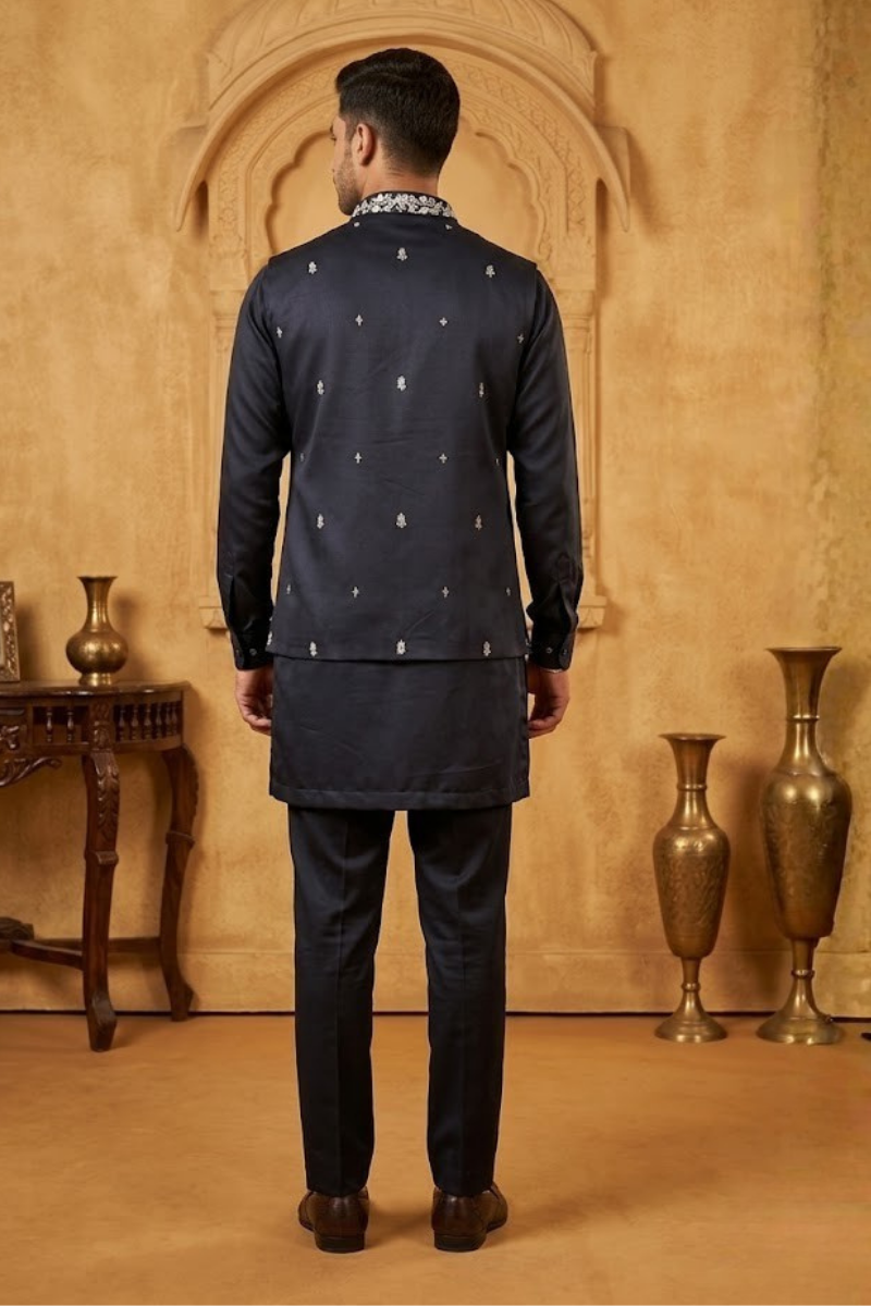 Blue kurta set with detailed white  embroidery of floral patterns and an elephant in bundi