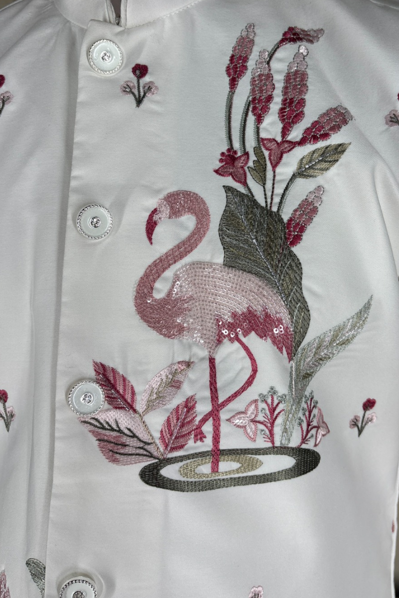 White kurta set with minimal embroidered bundi