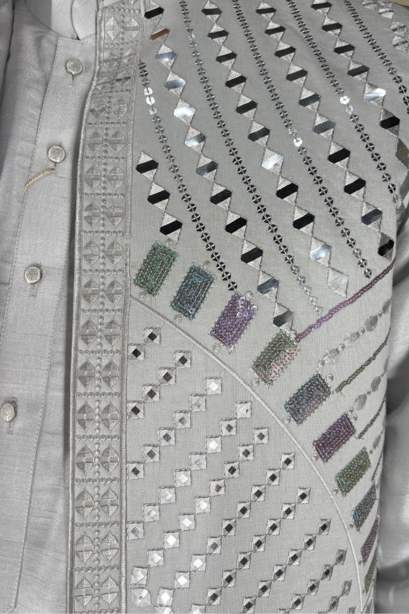 Light grey kurta set with mirror and thread work bundi