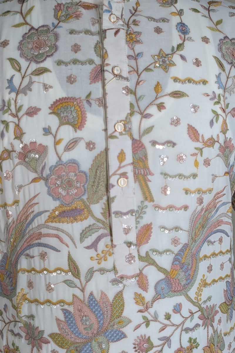 White colour kurta top with allover thread work and embroidery