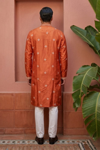 Rust colour kurta set with allover embroidered
