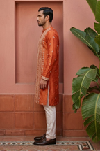 Rust colour kurta set with allover embroidered