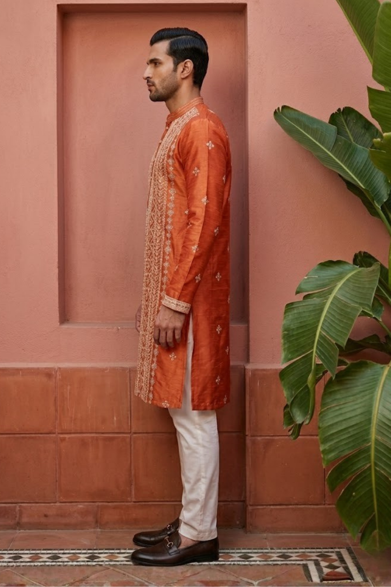 Rust colour kurta set with allover embroidered