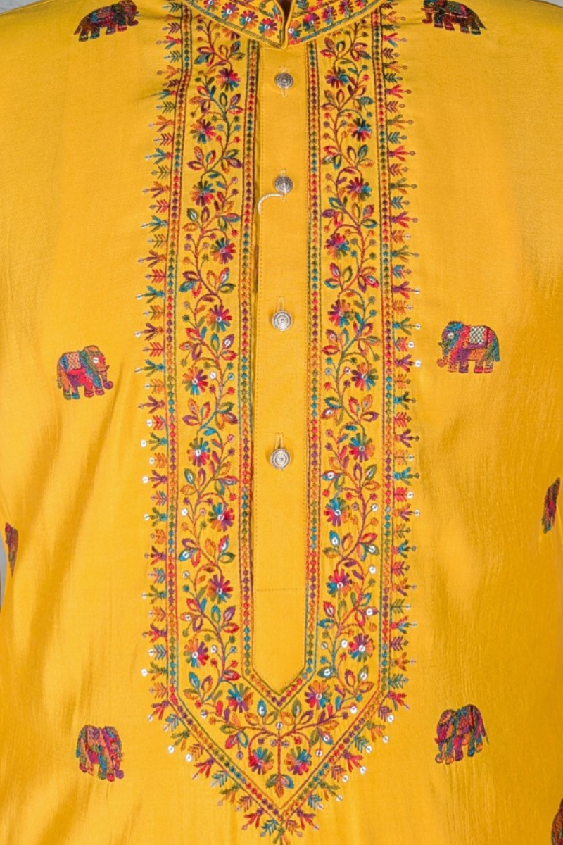 Yellow kurta top with thread work and elephant design
