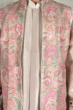 Peach coloured plain kurta set with printed colourful bundi