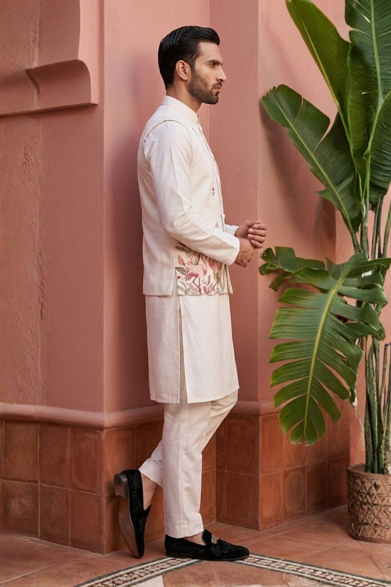 White kurta set with minimal embroidered bundi