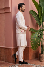 White kurta set with minimal embroidered bundi