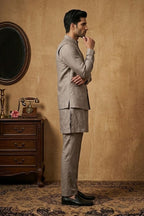 Grey plain kurta set with detailed hand embroidery of a peacock and minimal neck work bundi