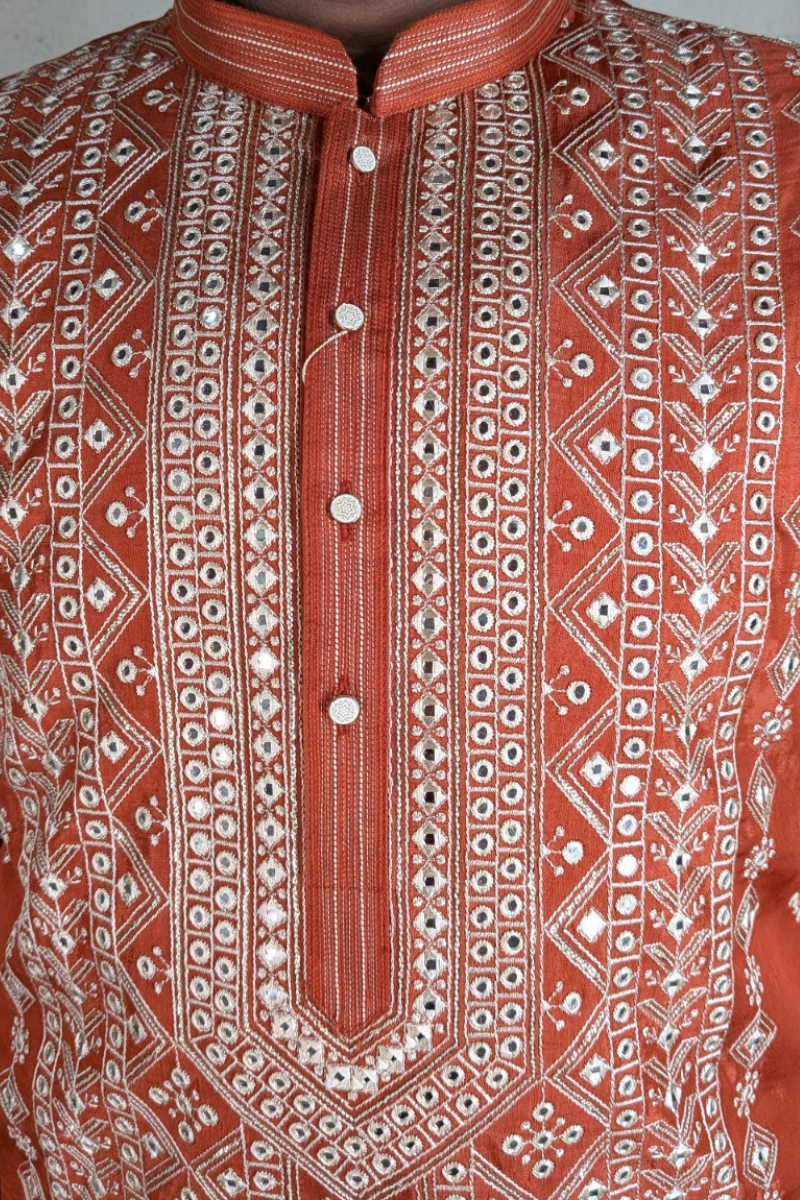 Rust colour kurta set with allover embroidered