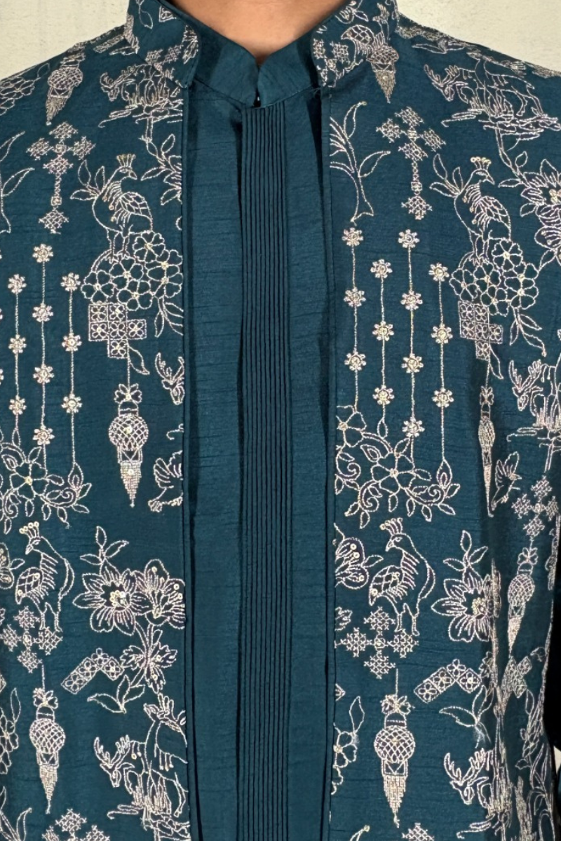 Blue colour plain kurta top and pant with embroidered bundi