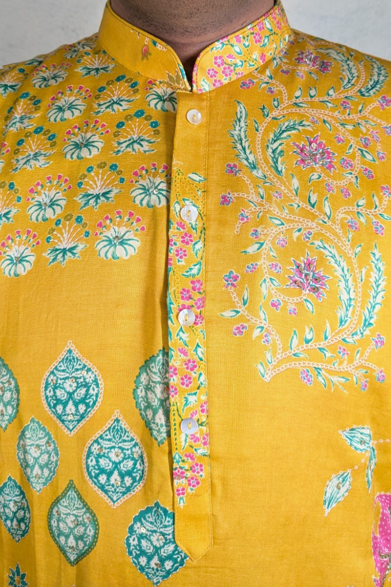 Yellow kurta with floral pattern work