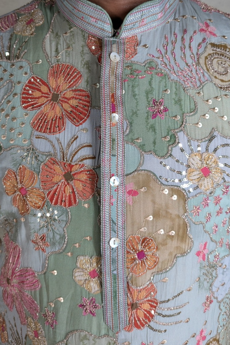 Grey colour kurta top with allover embroidery