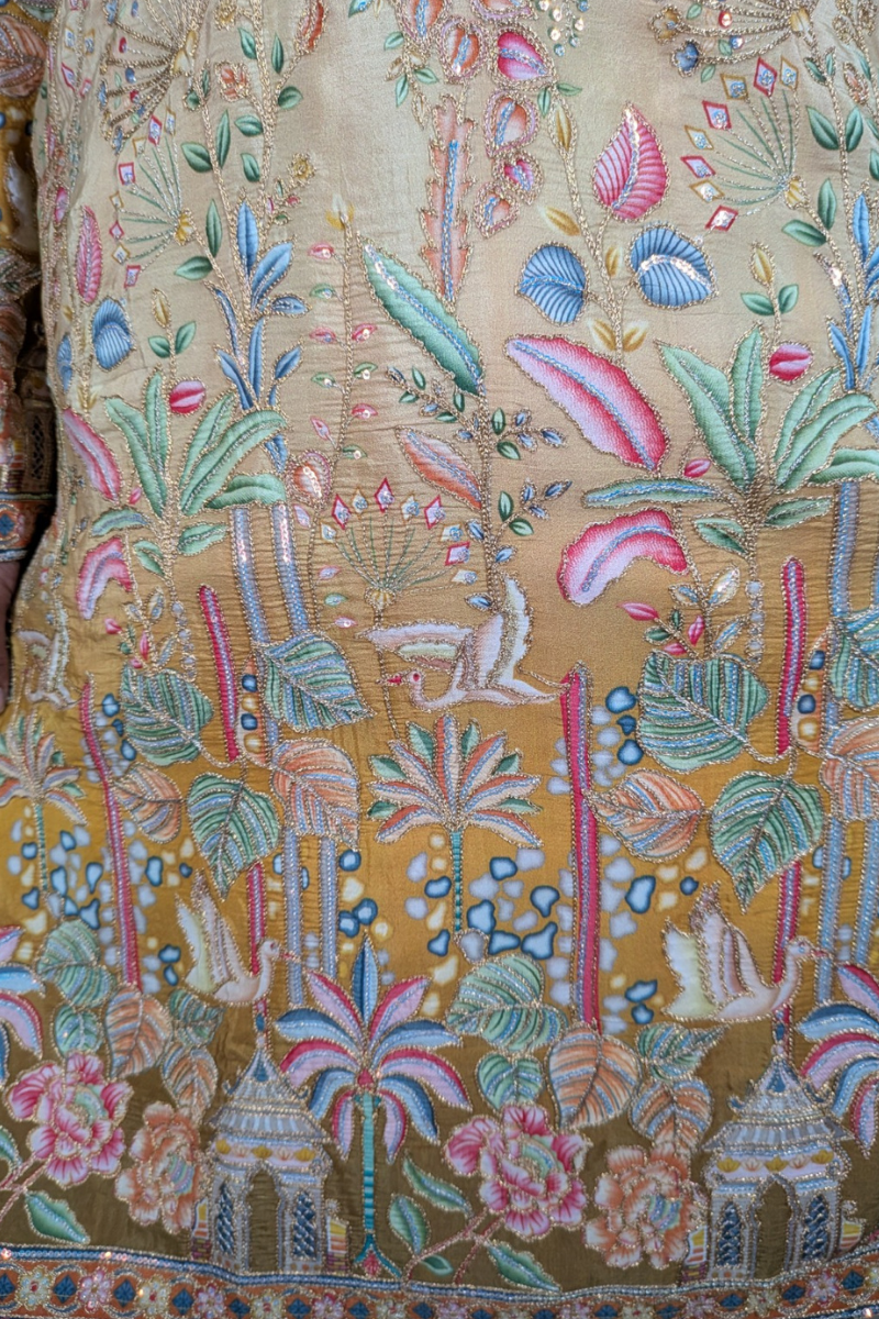 Cream colour kurta top with floral and architectural design embroidery