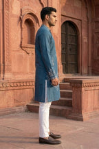Blue colour kurta set with white floral thread work