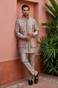 Green coloured plain kurta set with printed colourful bundi