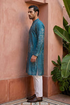 Blue colour kurta set with floral motifs