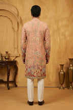 Pink colour kurta pant with floral and architectural design embroidery