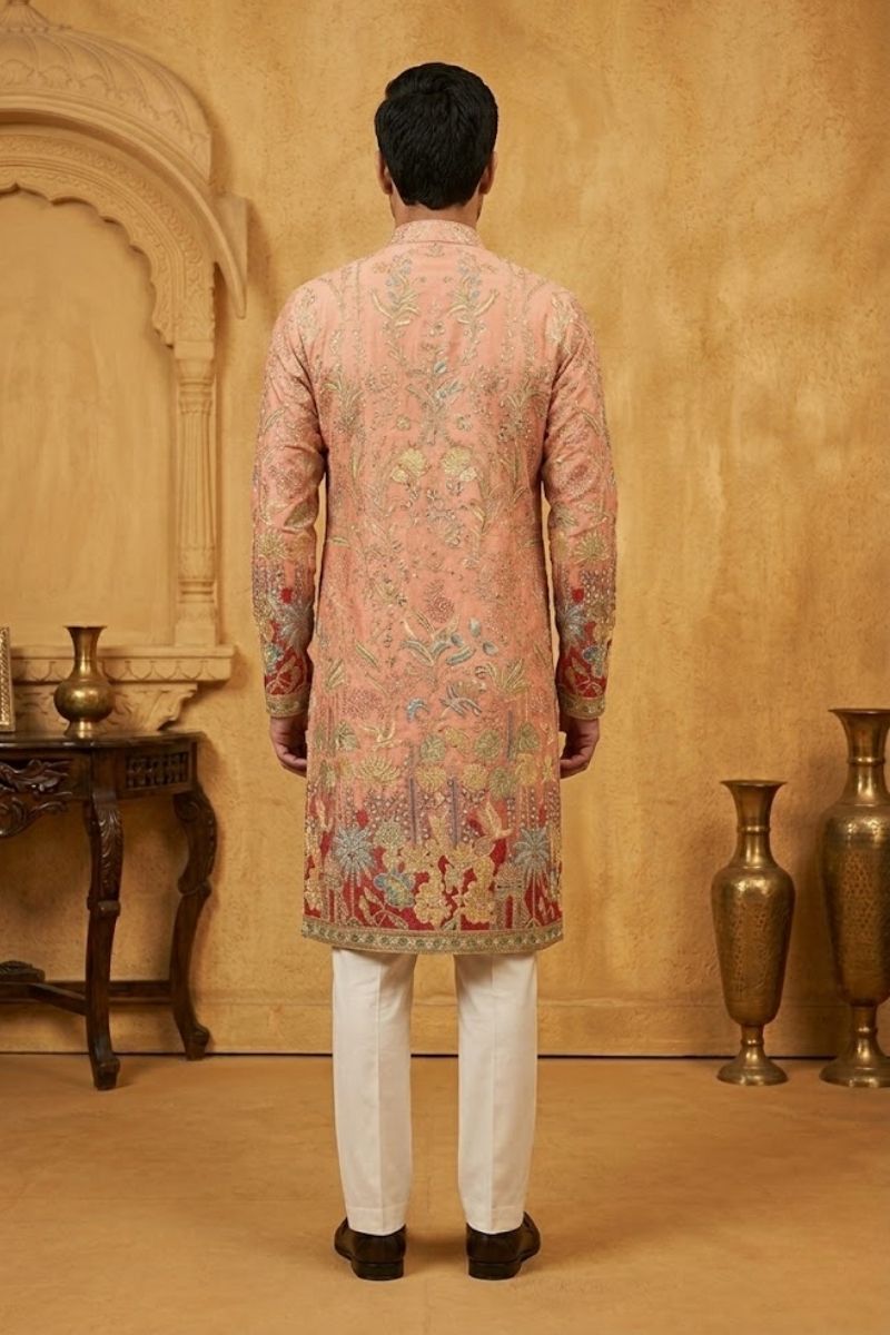 Pink colour kurta pant with floral and architectural design embroidery