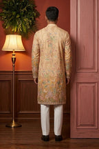 Cream colour kurta pant with floral and architectural design embroidery