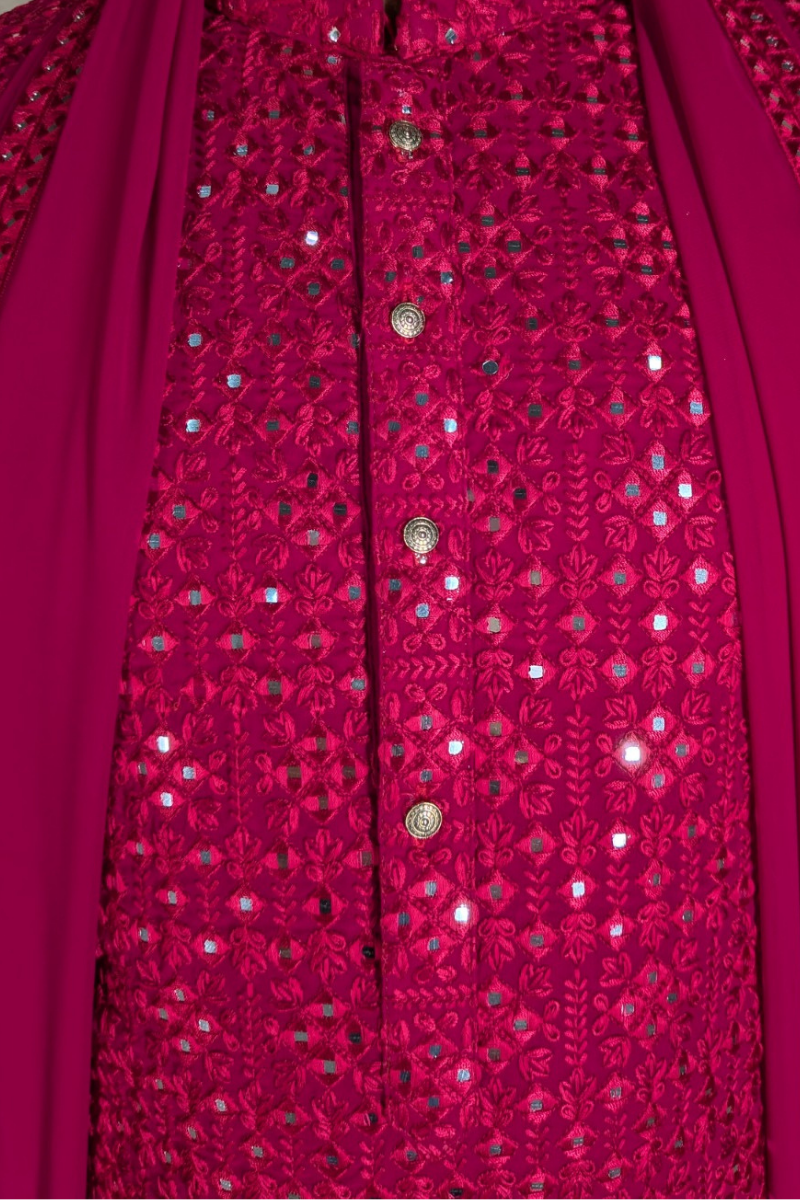 Rani colour kurta top and dupatta with allover thread and mirror work