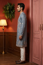 Grey colour kurta top with thread work and pant