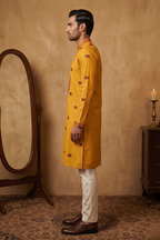 Yellow kurta top with thread work and elephant design and pant