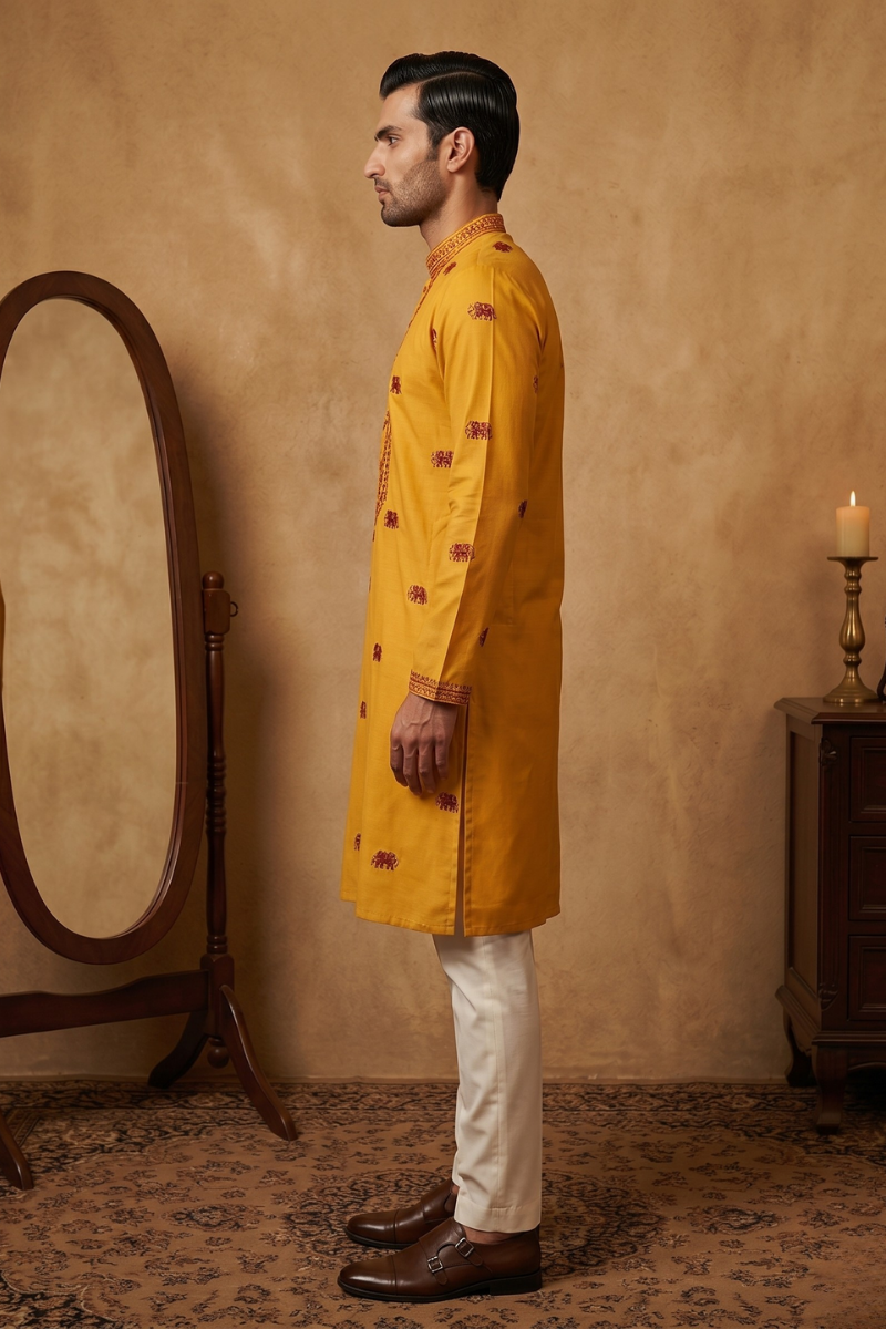 Yellow kurta top with thread work and elephant design and pant