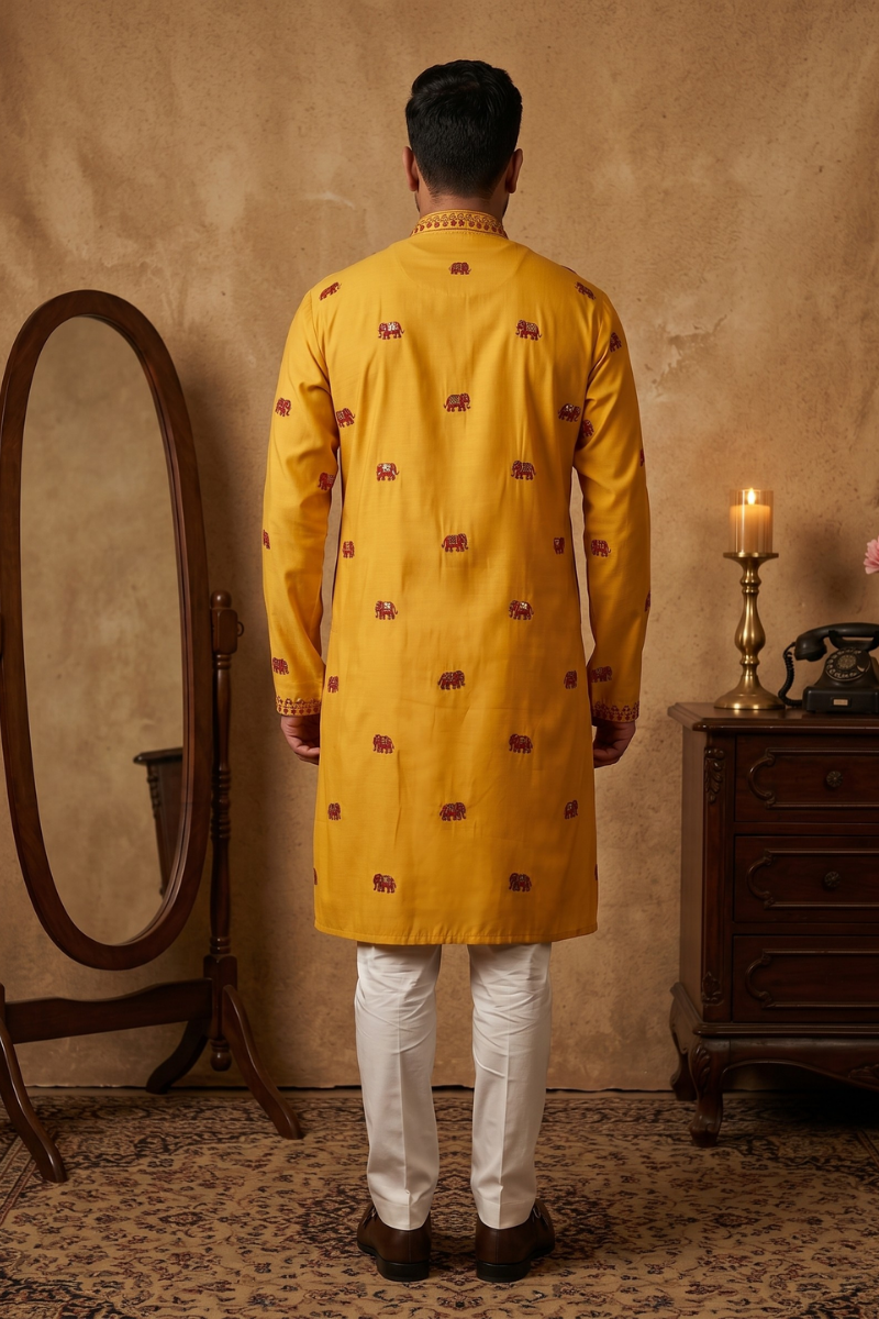 Yellow kurta top with thread work and elephant design and pant