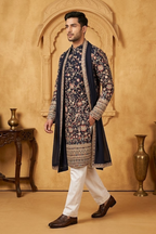 Black colour kurta top and dupatta with allover colourful thread work and pant
