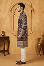 Black colour kurta top and dupatta with allover colourful thread work and pant
