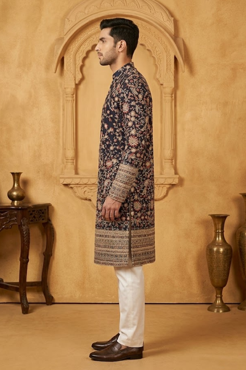 Black colour kurta top and dupatta with allover colourful thread work and pant