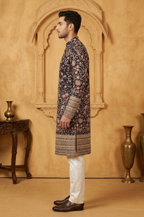 Black colour kurta top and dupatta with allover colourful thread work and pant
