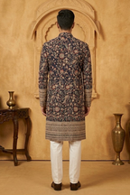 Black colour kurta top and dupatta with allover colourful thread work and pant