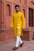 Yellow colour kurta top with sleeves with lotus and hummingbird details and pant