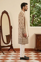 White colour kurta top and dupatta with allover colourful thread work and pant