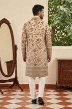 White colour kurta top and dupatta with allover colourful thread work and pant
