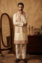 Gold colour kurta pant with colourful thread work bundi