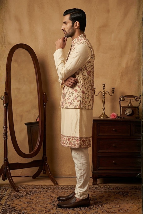 Gold colour kurta pant with colourful thread work bundi