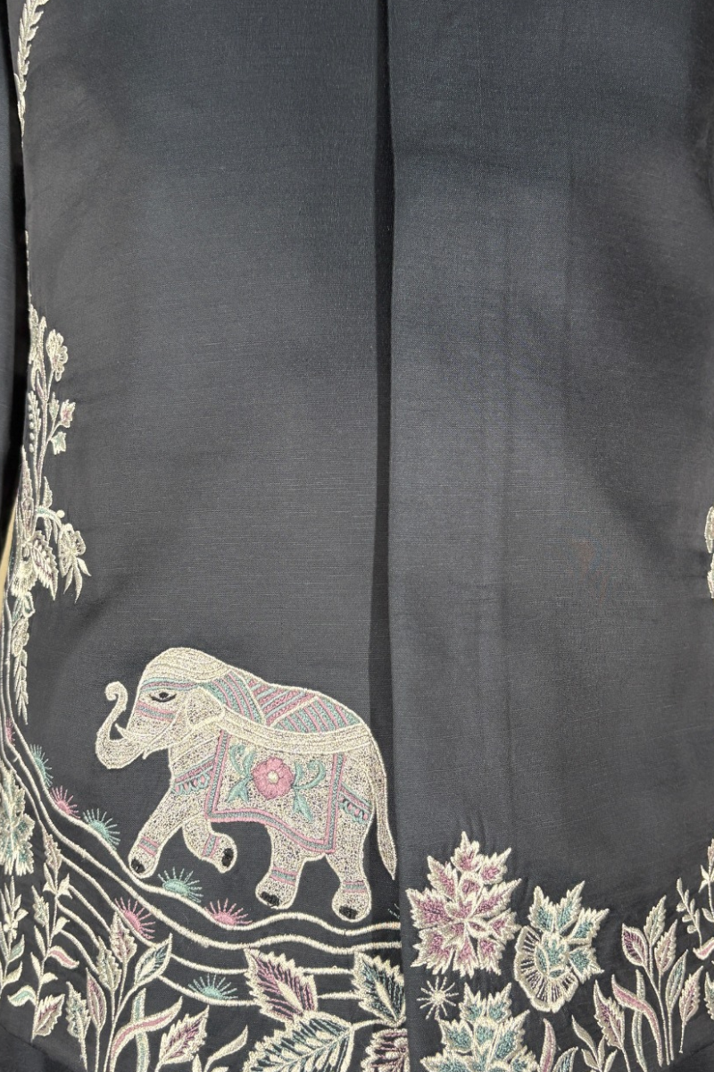 Blue kurta set with detailed white  embroidery of floral patterns and an elephant in bundi