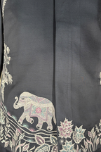 Blue kurta set with detailed white  embroidery of floral patterns and an elephant in bundi