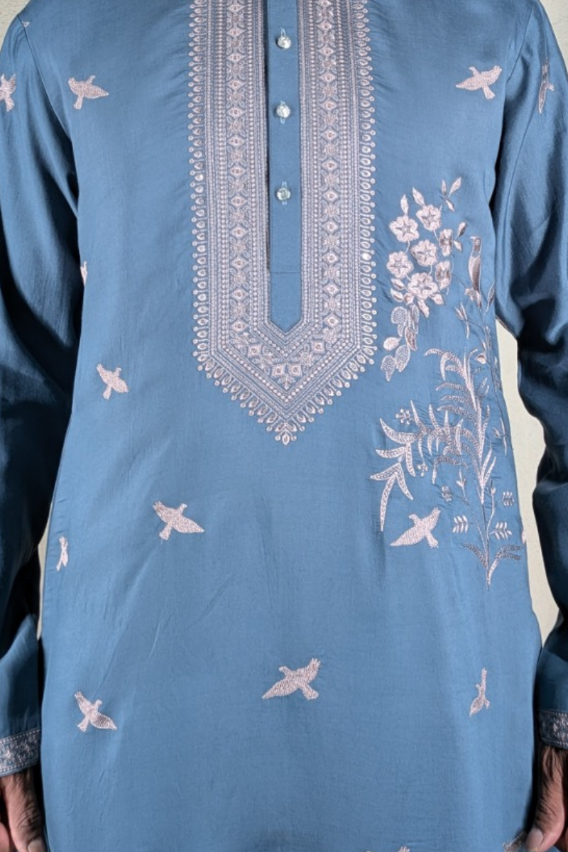 Grey colour kurta top with thread work