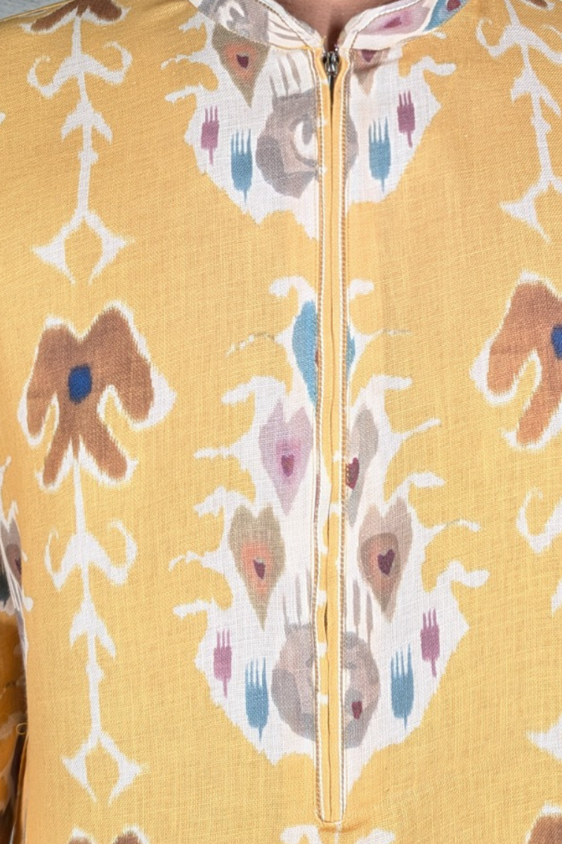 Yellow printed cotton blend kurta top with a half zipper