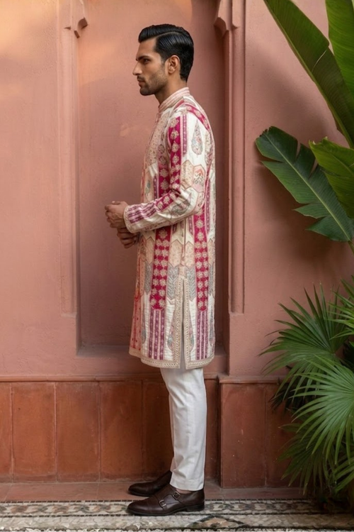 Royal Zari Motif Kurta Ensemble Ethnic kurta likely made of cotton or a similar kurta featuring intricate red and white patterns and embellishments kurta set