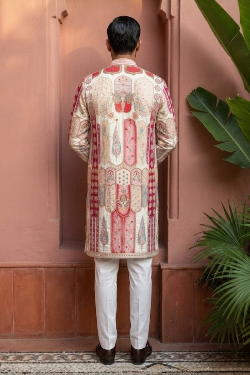 Royal Zari Motif Kurta Ensemble Ethnic kurta likely made of cotton or a similar kurta featuring intricate red and white patterns and embellishments kurta set