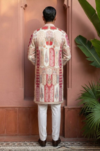 Royal Zari Motif Kurta Ensemble Ethnic kurta likely made of cotton or a similar kurta featuring intricate red and white patterns and embellishments kurta set