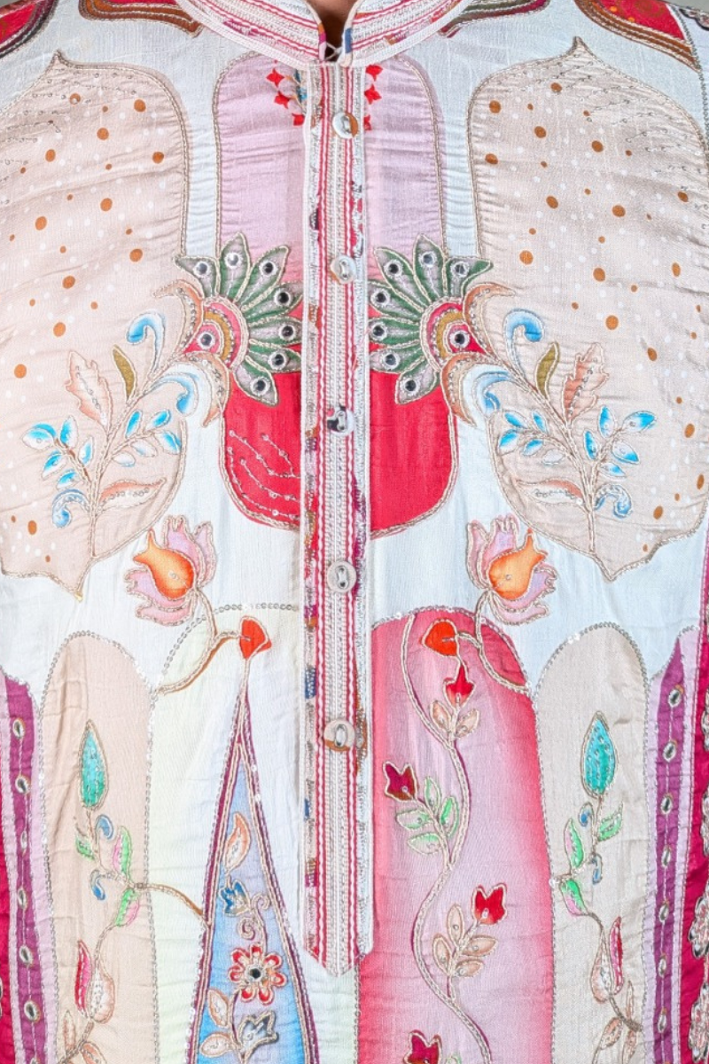 Royal Zari Motif Kurta Ensemble Ethnic kurta likely made of cotton or a similar kurta featuring intricate red and white patterns and embellishments kurta set