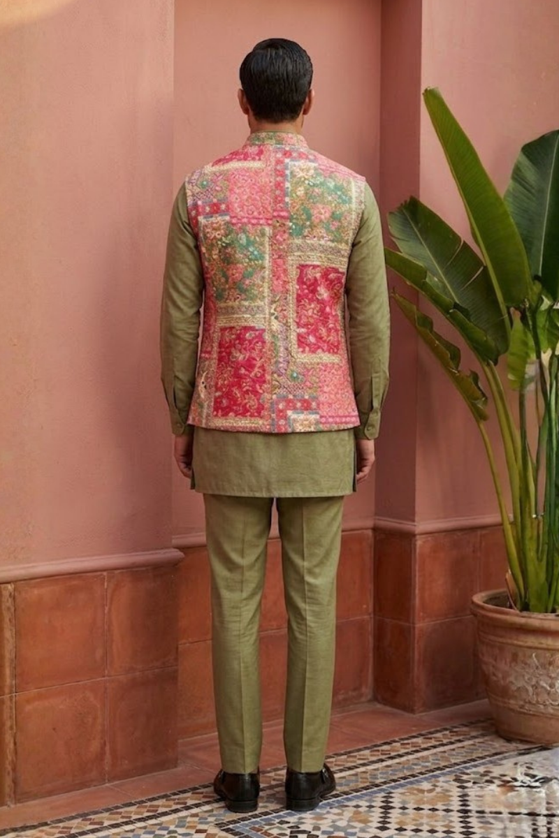 Plain green colour kurta set with mirror work and embroidered jacket