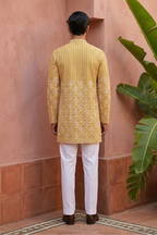 Yellow colour mirror work and embroidered kurta set