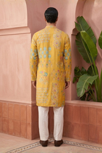 Yellow kurta with floral pattern work with pant